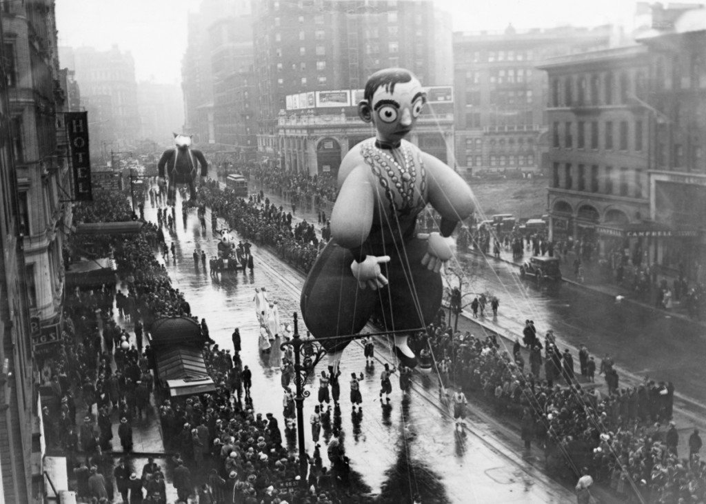 An Eddie Cantor balloon in the Macy's Thanksgiving Day Parade on Broadway, New York, 29th November 1934. (Photo by FPG/Getty Images)
